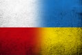 The Republic of Poland national flag with National flag of Ukraine. Grunge background Royalty Free Stock Photo