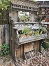 Repurposed vintage piano with flowers