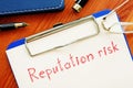 Reputation risk is shown on the business photo using the text Royalty Free Stock Photo