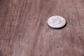 REPVBBLICA ITALIANA, Coin of Italy on the wooden floor, 50 Lire