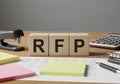 Request for proposal rfp process management procurement business document strategy wooden blocks office Royalty Free Stock Photo