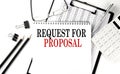 Request For Proposal word on notepad with clipboard , chart and calculator, business concept Royalty Free Stock Photo