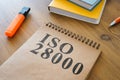 Requirements for ISO 28000 and other papers on the table.