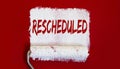 Rescheduled .One open can of paint with white brush on red background. Top view Royalty Free Stock Photo