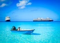 Rescue boat and cruise ships at sea