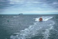 Rescue boat sailing in a dark blue sea Royalty Free Stock Photo