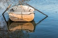 The rescue boat was moored to the shore of the pond. Royalty Free Stock Photo