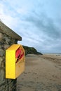 Rescue buoy on empty beach Royalty Free Stock Photo