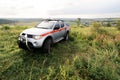 A rescue car stands in the middle of the field in summer Royalty Free Stock Photo