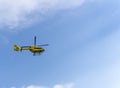 The rescue helicopter and emergencies in flight. Yellow medical helicopter. Air ambulance. Medical Air Assistance