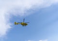 The rescue helicopter and emergencies in flight. Yellow medical helicopter. Air ambulance. Medical Air Assistance