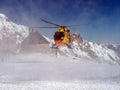 Rescue helicopter in the mountains