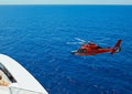 Rescue helicopter at sea Royalty Free Stock Photo