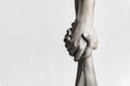 Rescue, helping gesture or hands. Strong hold. Two hands, helping hand of a friend. Handshake, arms friendship. Black Royalty Free Stock Photo