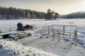 Rescue hovercraft on the snow covered ice of lake in sunny winter day