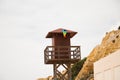 rescue hut on a sandy beach, safe relax by the ocean, a beautiful sunny day, vacation. Beach Watchtower Royalty Free Stock Photo