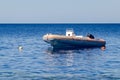 Rescue inflatable boat in the blue sea