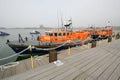 Rescue lifeboats moored at quay