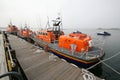 Rescue lifeboats moored at quay