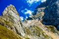 Rescue mission with helicopter in alpine mountain landscape. Royalty Free Stock Photo