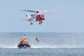 The rescue operation on sea. Coast Guard Helicopter. Royalty Free Stock Photo