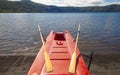 Rescue Rowing Boat on lake shoreline Royalty Free Stock Photo