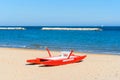 Rescue rowing catamaran on the sand, rowing boat used for rescue Royalty Free Stock Photo