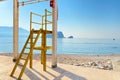 Rescue station on the sea beach. Rescue cabin on the coastline in sunny day, beach without people Royalty Free Stock Photo