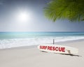 Rescue surf board on tropic beach background