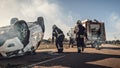 Rescue Team of Firefighters Arrive on the Car Crash Traffic Accident Scene on their Fire Engine. F Royalty Free Stock Photo