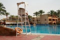 rescue tower lifeguard life buoy near the pool in the hotel Egypt. Palms tree Royalty Free Stock Photo