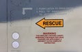 Rescue warning yellow arrow sign on fuselage of modern jet fighter Royalty Free Stock Photo