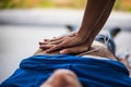 Rescuer making CPR to unconscious man Royalty Free Stock Photo