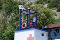 The rescuer on the rescue tower observes the shore. Novorossiysk beach. Royalty Free Stock Photo