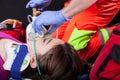 Rescuer using oxygen mask Royalty Free Stock Photo