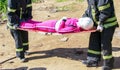 Rescuers carry on a stretcher