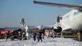 Rescuers cut the door to the plane