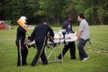 Rescuers rush an injured to Medivac helicopter