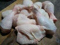 Close up of raw chicken drumsticks and thighs