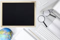 Research concept, top view of desk with blackboard computer