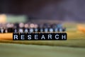 RESEARCH concept wooden blocks on the table. Royalty Free Stock Photo