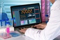 Research geneticist using computer biotechnology lab Royalty Free Stock Photo