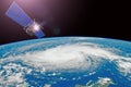 Research, probing, monitoring hurricane. Satellite above the Earth makes measurements of the weather parameters. Elements of this Royalty Free Stock Photo