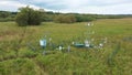 Station science research for studying wetlands meadows, drone aerial video shot ecosystem weather station swamp willows
