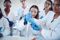 Research, students and professor for medical innovation, laboratory or knowledge. Researcher, young people and female Royalty Free Stock Photo