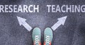 Research and teaching as different choices in life - pictured as words Research, teaching on a road to symbolize making decision