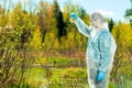 a researcher chemist-environmentalist conducts a visual inspection of water