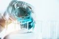 Researcher with glass laboratory chemical test tubes with liquid Royalty Free Stock Photo