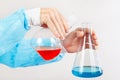Researcher hands is conducting chemical experiments in laboratory