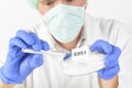 Researcher holding sweetener E951 Royalty Free Stock Photo